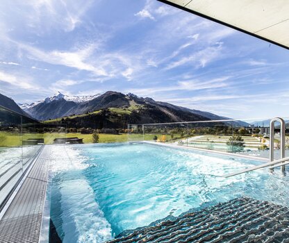 Glass panorama pool with glacier views