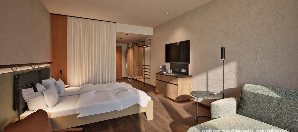 Helles, modernes Hotelzimmer mit Holzmöbeln und Sofa