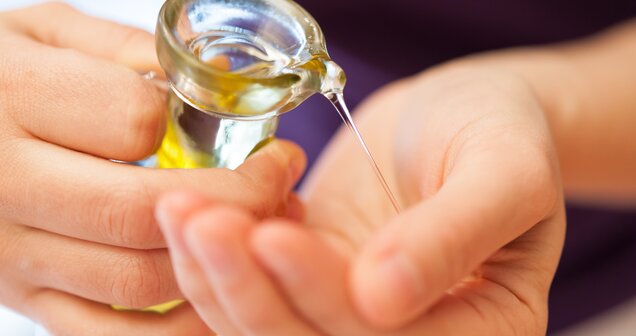 Massage oil is poured into a hand | © Copyright 2012, Alexander Maria Lohmann