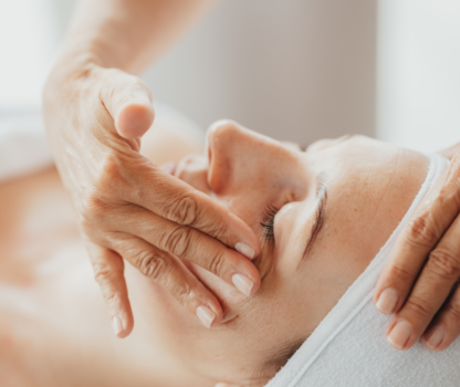 Woman's face during a relaxing facial massage